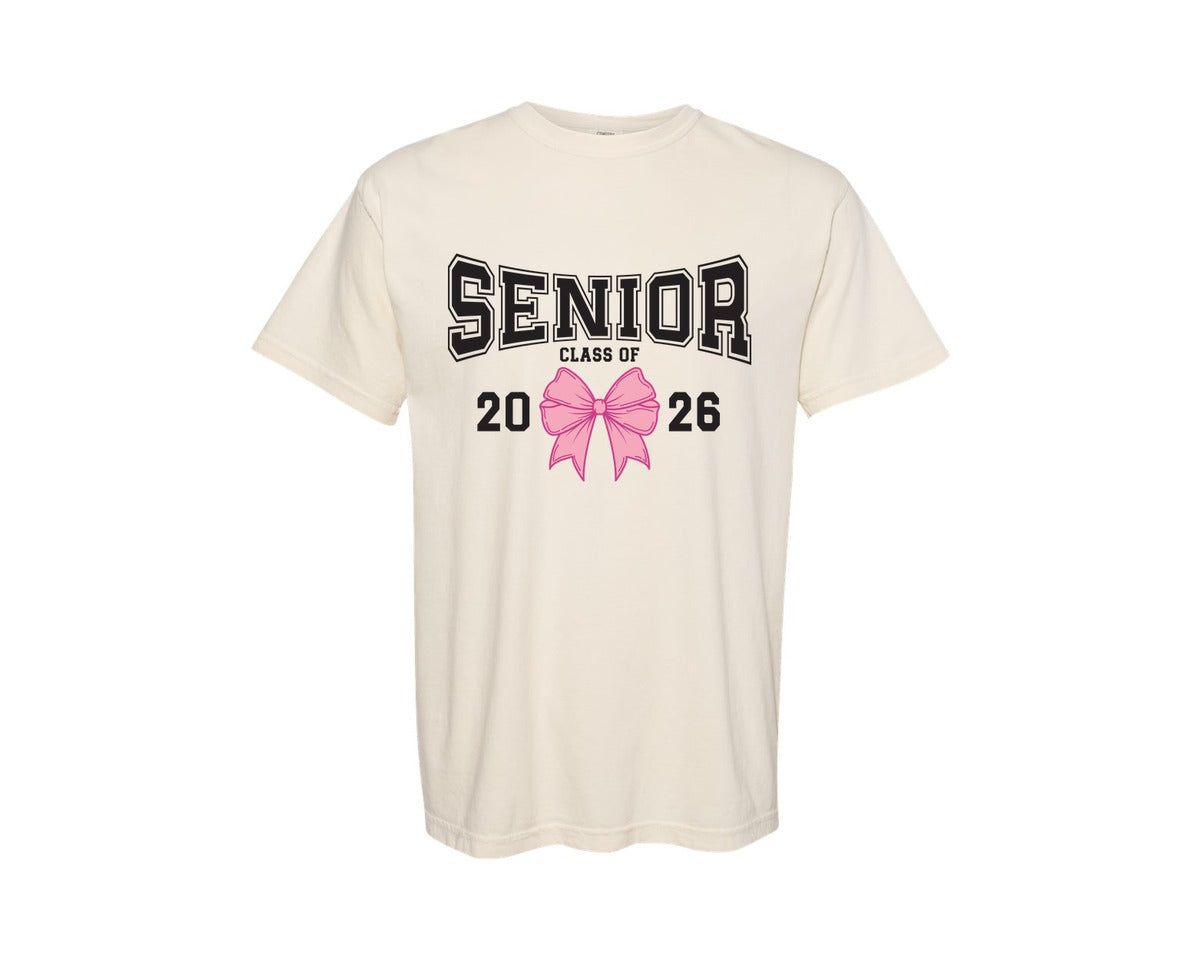 brand:Comfort Colors|color:Ivory|Senior Class Of 2026 Coquette Pink Bow 2 Graphic T-Shirt