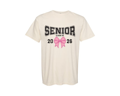 brand:Comfort Colors|color:Ivory|Senior Class Of 2026 Coquette Pink Bow 2 Graphic T-Shirt