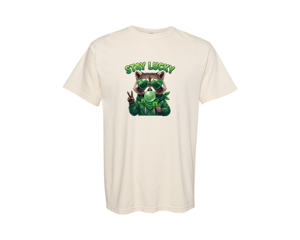 brand:Comfort Colors|color:Ivory|Stay Lucky Raccoon St Patrick Graphic T-Shirt