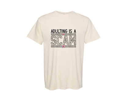 brand:Comfort Colors|color:Ivory|Adulting Is A Scam Sarcastic 2 Graphic T-Shirt