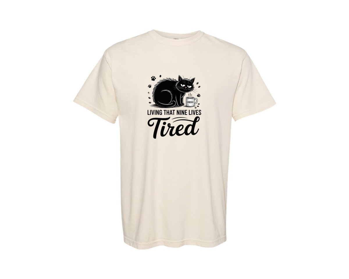 brand:Comfort Colors|color:Ivory|Living That Nine Lives Tired Cat Subl Graphic T-Shirt