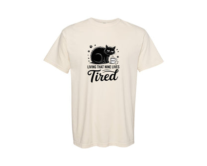 brand:Comfort Colors|color:Ivory|Living That Nine Lives Tired Cat Subl Graphic T-Shirt