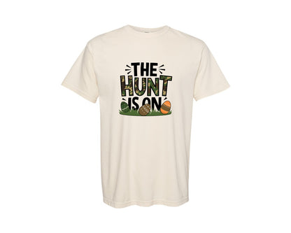 brand:Comfort Colors|color:Ivory|The Hunt Is On Camo Easter Egg Camo Graphic T-Shirt
