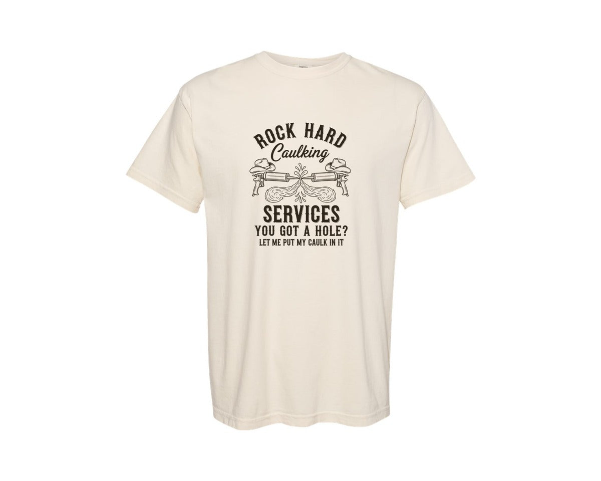 brand:Comfort Colors|color:Ivory|Rock Hard Caulking Services Graphic T-Shirt