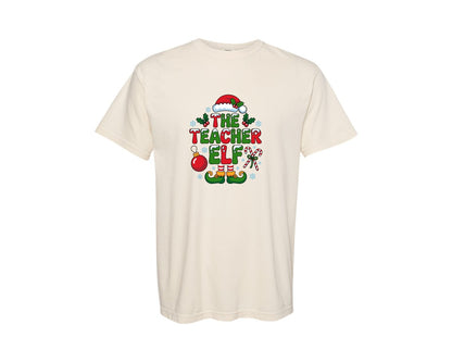 brand:Comfort Colors|color:Ivory|The Teacher Elf Christmas Xmas Graphic T-Shirt