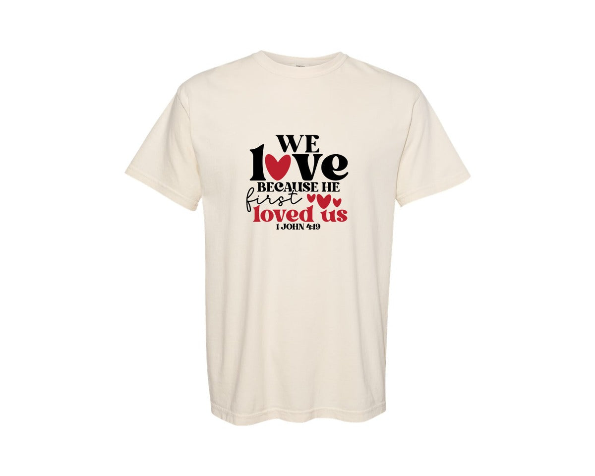 brand:Comfort Colors|color:Ivory|We Love Because He First Loved Us 60 Graphic T-Shirt