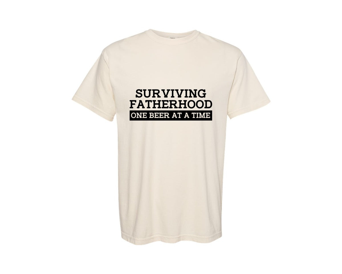 brand:Comfort Colors|color:Ivory|Surviving Fatherhood Mens T Shirt Graphic T-Shirt