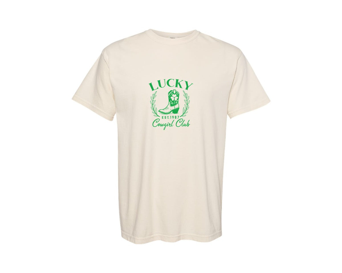 brand:Comfort Colors|color:Ivory|Lucky Cowgirl Pngst Patricks Day Graphic T-Shirt
