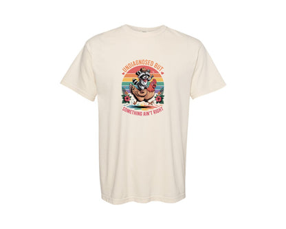 brand:Comfort Colors|color:Ivory|Undiagnosed Raccoon Riding Chicken Graphic T-Shirt