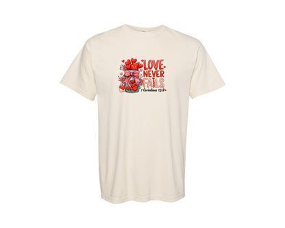 brand:Comfort Colors|color:Ivory|Love Never Fails Valentine Graphic T-Shirt