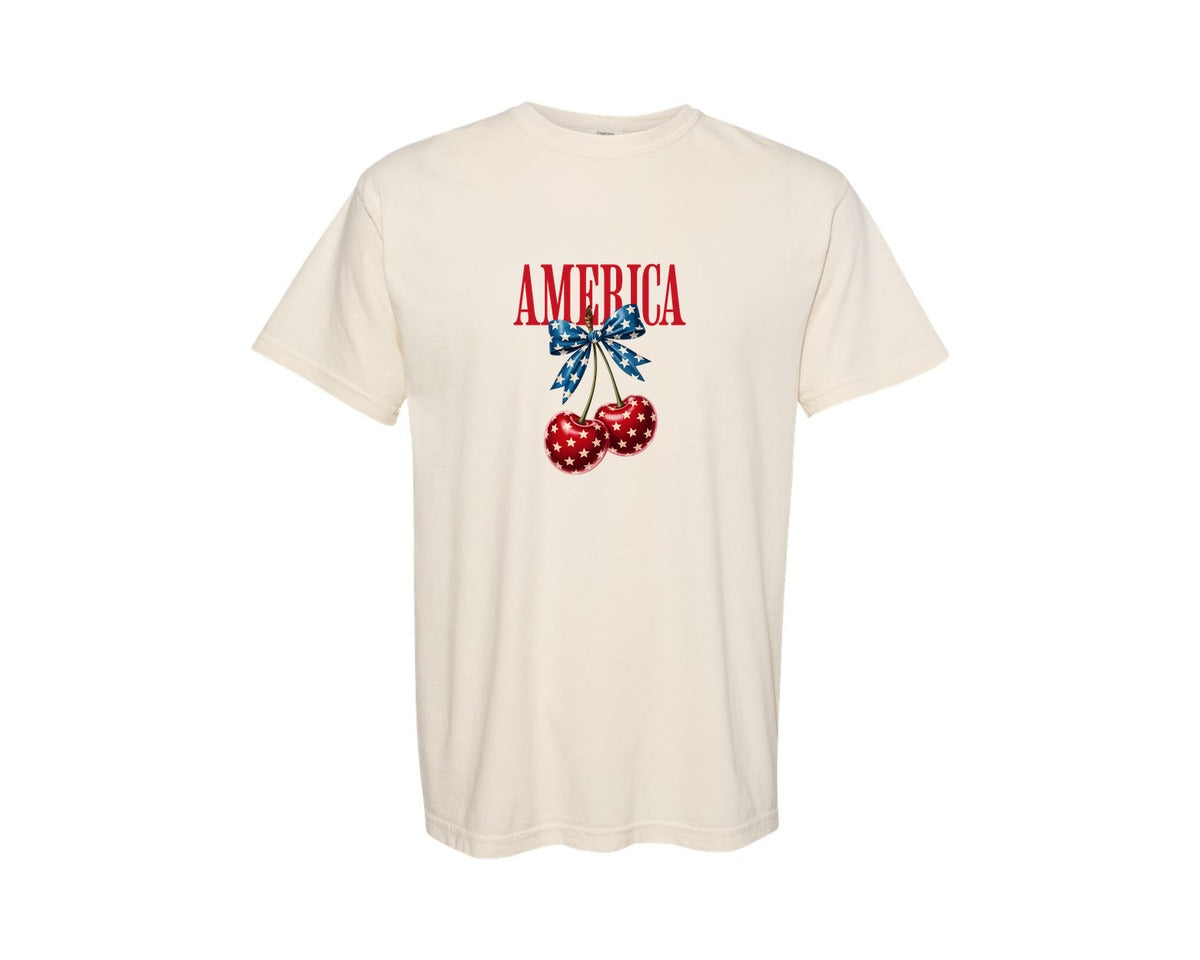 brand:Comfort Colors|color:Ivory|4Th Of July America Cherry Coquette Bow 2 Graphic T-Shirt