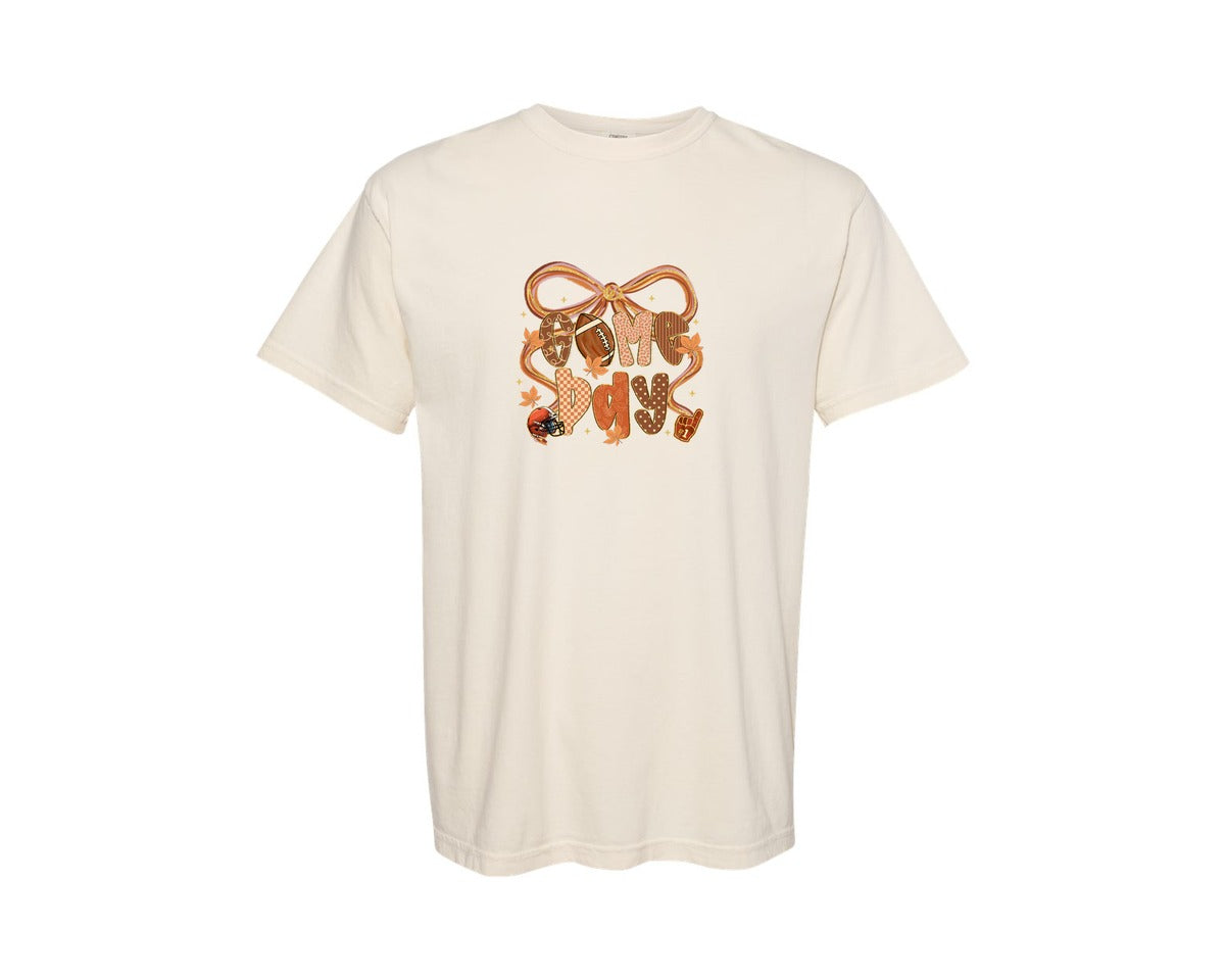 brand:Comfort Colors|color:Ivory|Game Day Fall Football Coquette Graphic T-Shirt