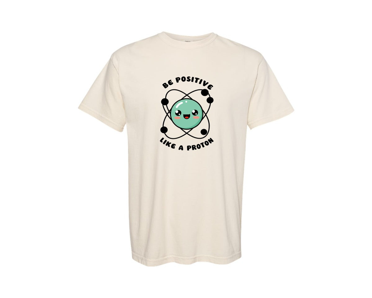 brand:Comfort Colors|color:Ivory|Be Positive Like A Proton Graphic T-Shirt