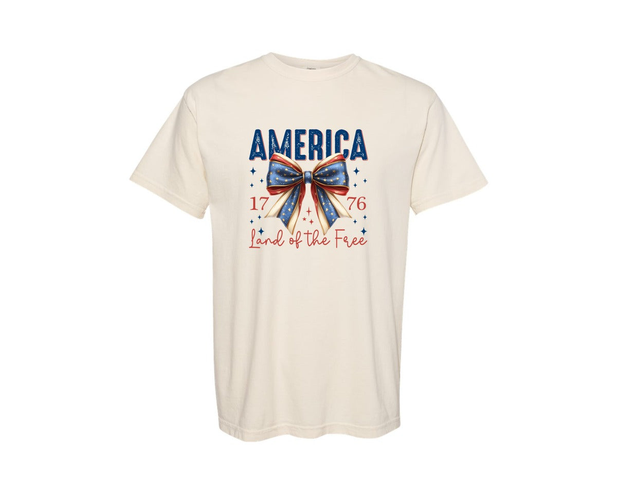 brand:Comfort Colors|color:Ivory|America Bow Land Of The Free Graphic T-Shirt