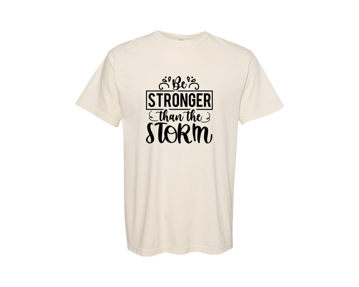 brand:Comfort Colors|color:Ivory|Be Stronger Than The Storm Svgjesus Graphic T-Shirt
