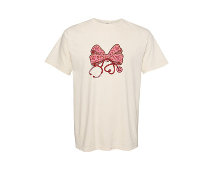 brand:Comfort Colors|color:Ivory|Valentine Nurse Stethoscope Coquette Bow Graphic T-Shirt