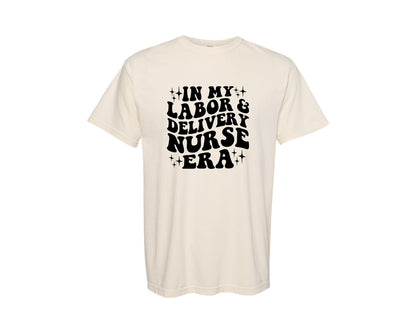 brand:Comfort Colors|color:Ivory|In My Labor And Delivery Nurse Era 2 Graphic T-Shirt