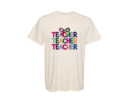 brand:Comfort Colors|color:Ivory|Knitted Coquette Teacher Typography Graphic T-Shirt