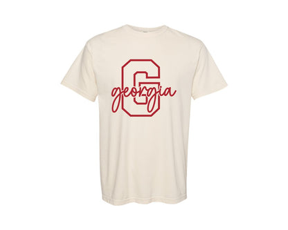 brand:Comfort Colors|color:Ivory|Georgia Initial Football Graphic T-Shirt