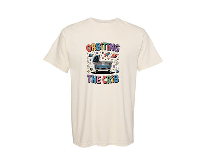 brand:Comfort Colors|color:Ivory|Orbiting The Crib Baby Space Art Graphic T-Shirt