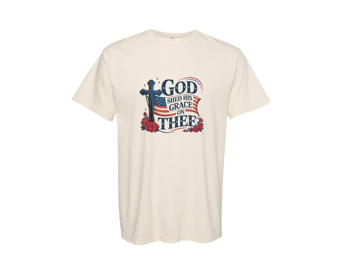 brand:Comfort Colors|color:Ivory|God Shed His Grace Us Flag Cross Graphic T-Shirt