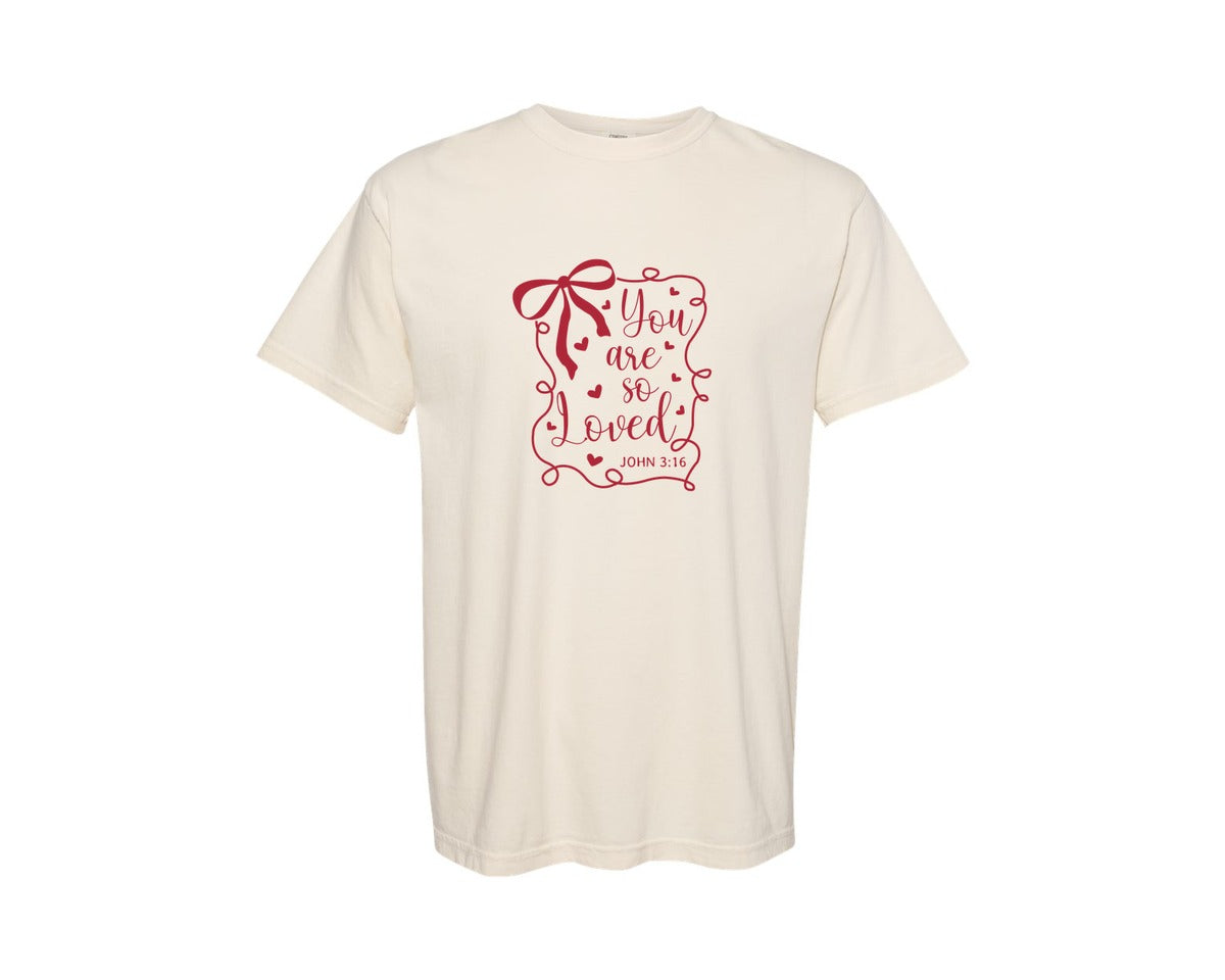 brand:Comfort Colors|color:Ivory|Coquette Bow You Are So Loved John Graphic T-Shirt
