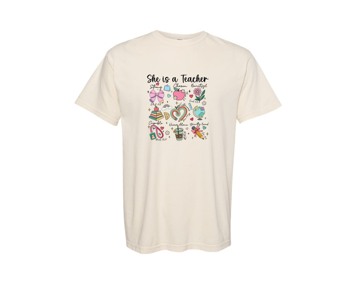 brand:Comfort Colors|color:Ivory|She Is A Teacher Faith Quote Design Graphic T-Shirt