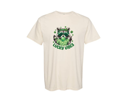 brand:Comfort Colors|color:Ivory|Lucky Vibes Raccoon St Patrick Graphic T-Shirt