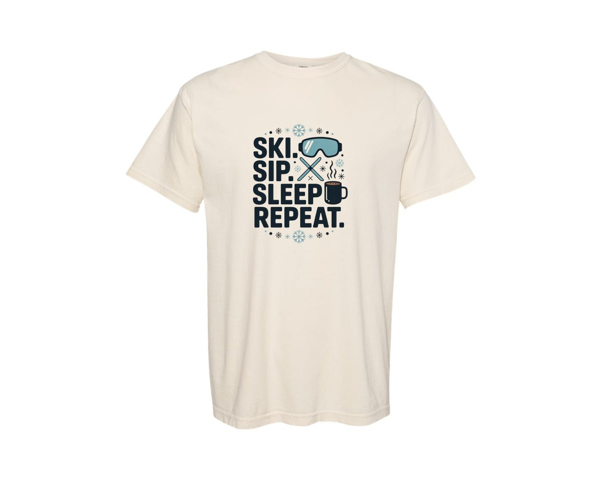brand:Comfort Colors|color:Ivory|Ski Sip Sleep Repeat Graphic T-Shirt