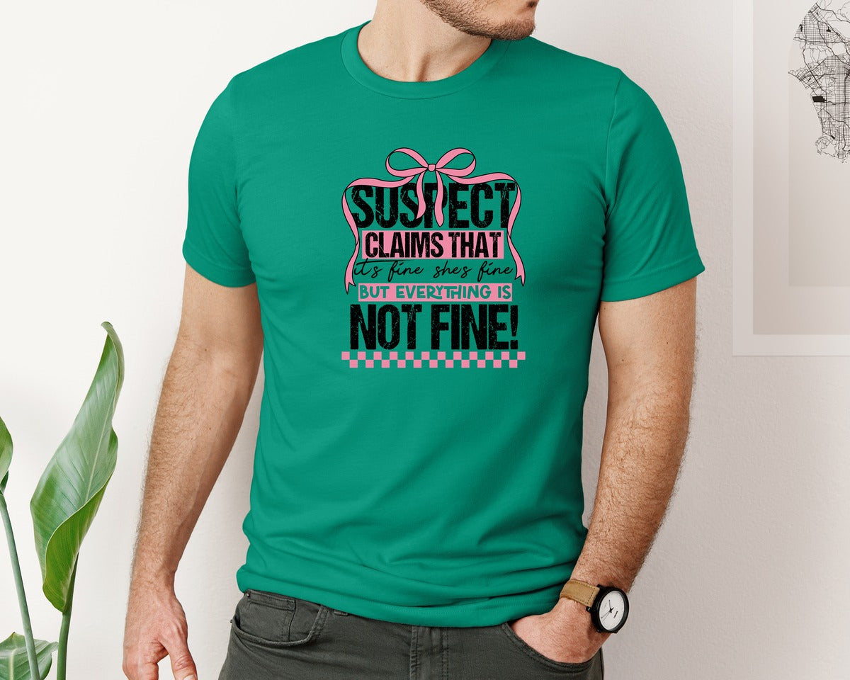 brand:Bella Canvas|color:Kelly|Suspect Claims Its Fine Shes Fine But Graphic T-Shirt