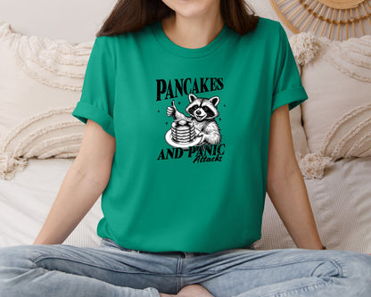 brand:Bella Canvas|color:Kelly|Mental Health Raccoon Pancakes And Panic Graphic T-Shirt