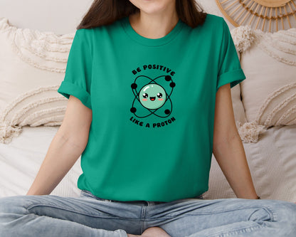 brand:Bella Canvas|color:Kelly|Be Positive Like A Proton Graphic T-Shirt