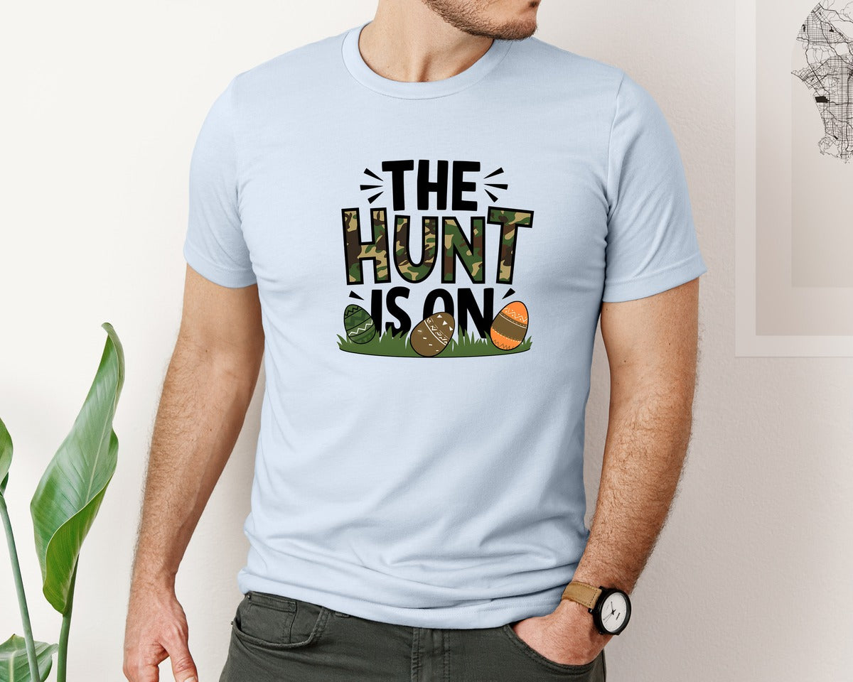 brand:Bella Canvas|color:Light Blue|The Hunt Is On Camo Easter Egg Camo Graphic T-Shirt