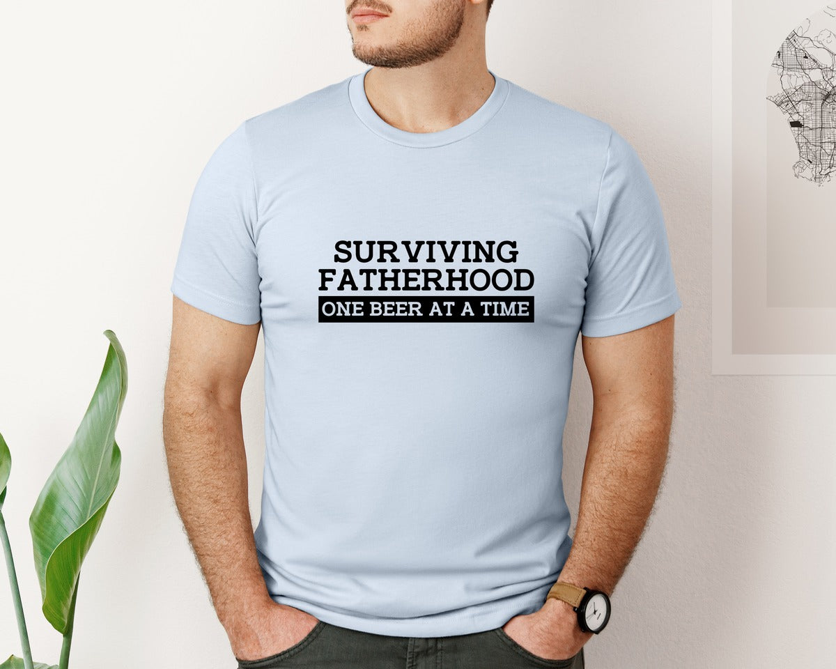 brand:Bella Canvas|color:Light Blue|Surviving Fatherhood Mens T Shirt Graphic T-Shirt
