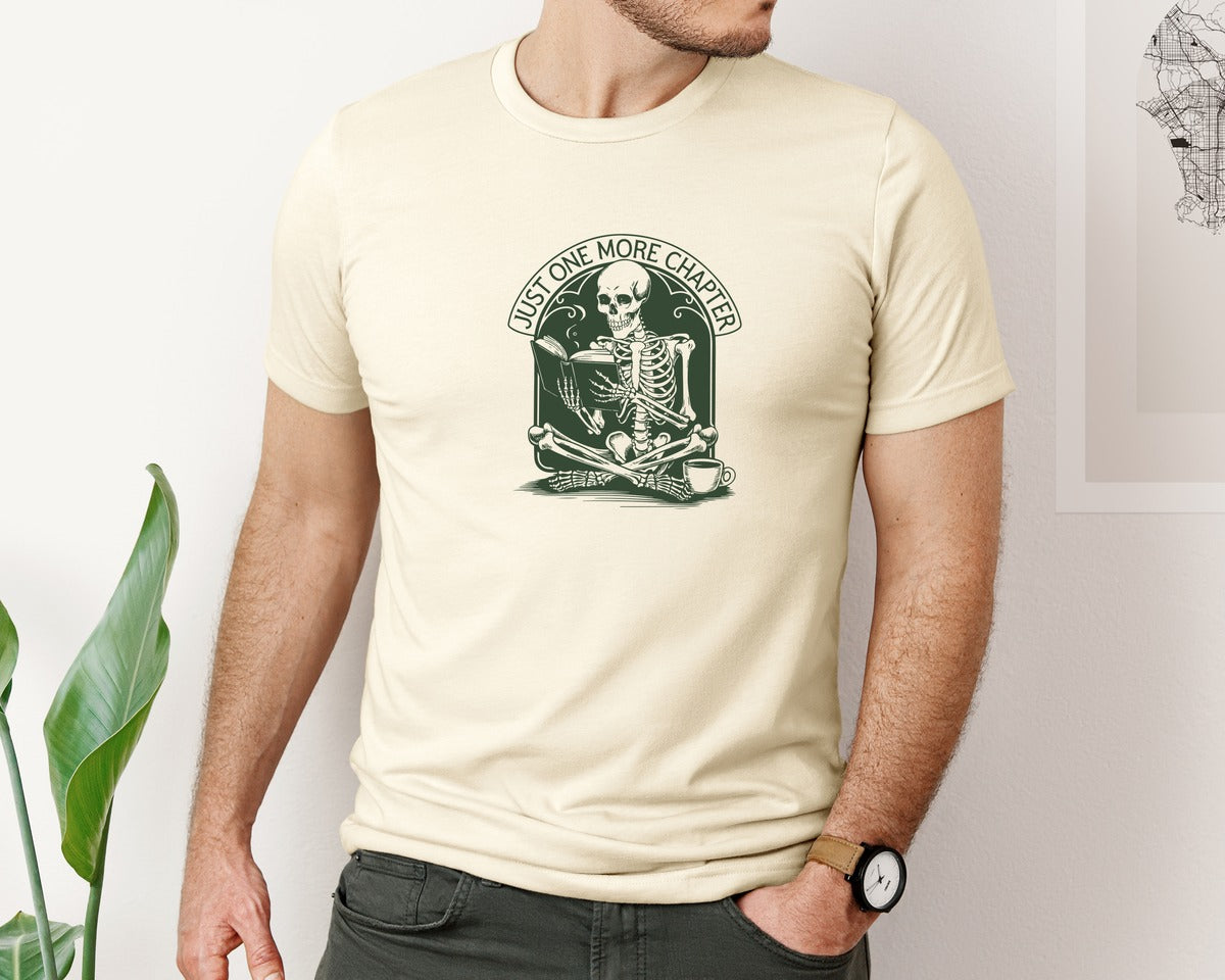 brand:Bella Canvas|color:Light Cream / Natural|Just One More Chapter Skeleton Coffee 2 Graphic T-Shirt