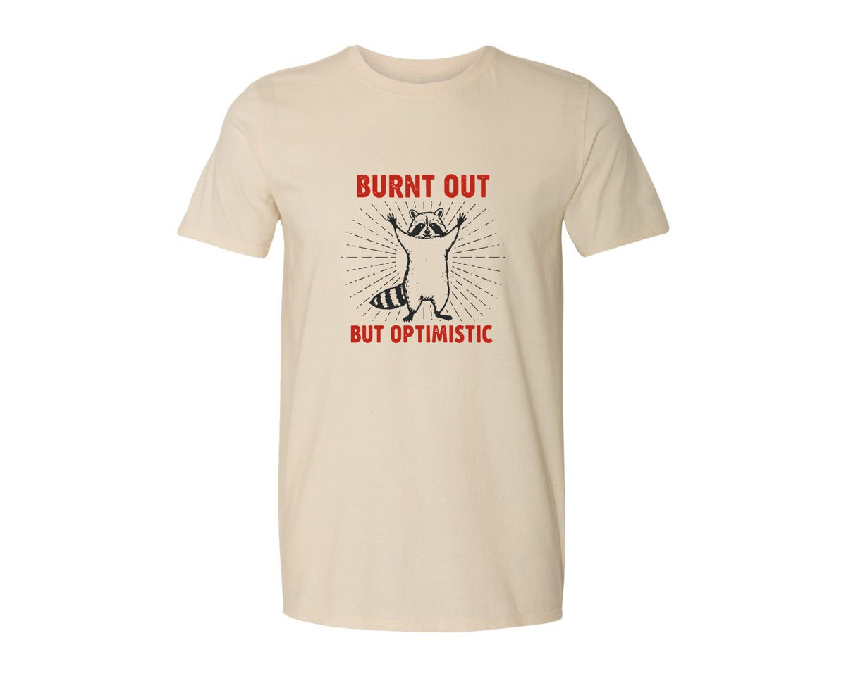 brand:Generic|color:Light Cream / Natural|Burnt Out But Optimistic Raccoon Graphic T-Shirt