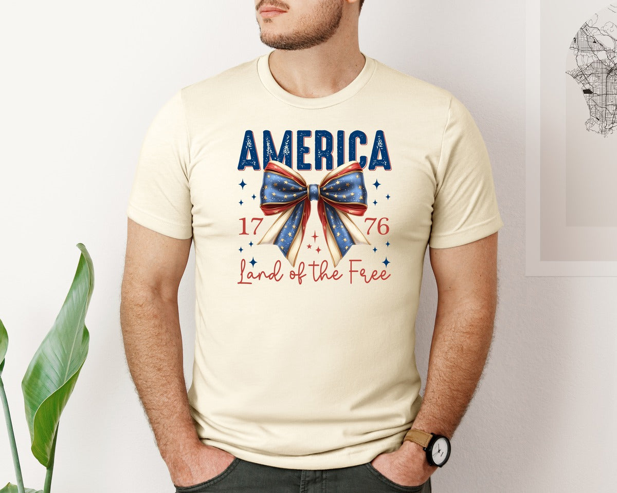 brand:Bella Canvas|color:Light Cream / Natural|America Bow Land Of The Free Graphic T-Shirt
