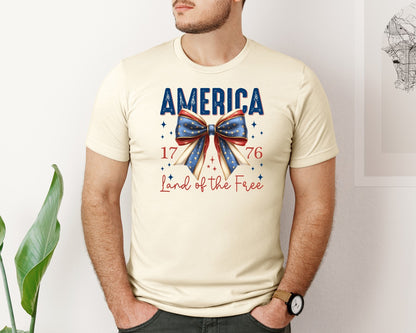 brand:Bella Canvas|color:Light Cream / Natural|America Bow Land Of The Free Graphic T-Shirt