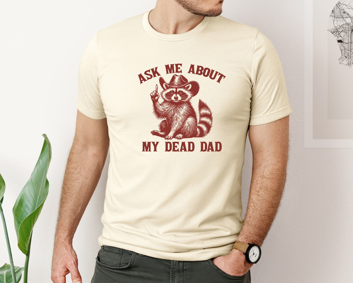 brand:Bella Canvas|color:Light Cream / Natural|Dead Dad Club Unhinged Meme Raccoon Graphic T-Shirt