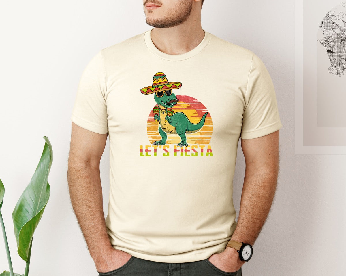 brand:Bella Canvas|color:Light Cream / Natural|Lets Fiesta Dinosaur Cinco De Mayo Graphic T-Shirt