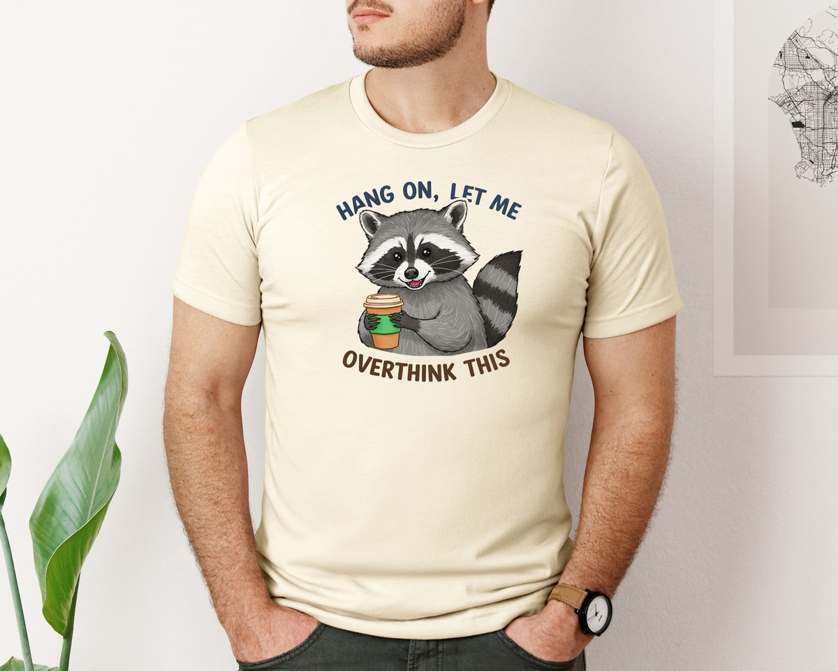 brand:Bella Canvas|color:Light Cream / Natural|Hang On Let Me Overthink This Raccoon 3 Graphic T-Shirt