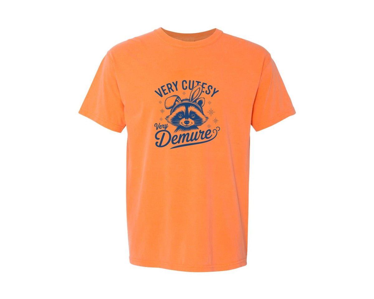 brand:Comfort Colors|color:Melon|Very Cutesy Very Demure Raccoon T Shirt Graphic T-Shirt