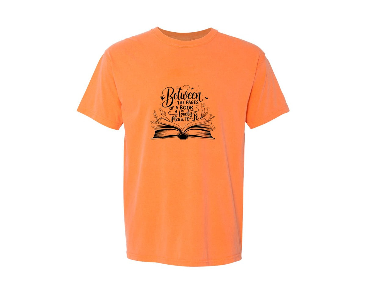brand:Comfort Colors|color:Melon|Between The Pages Of A Book Is A Lovely 24 Graphic T-Shirt