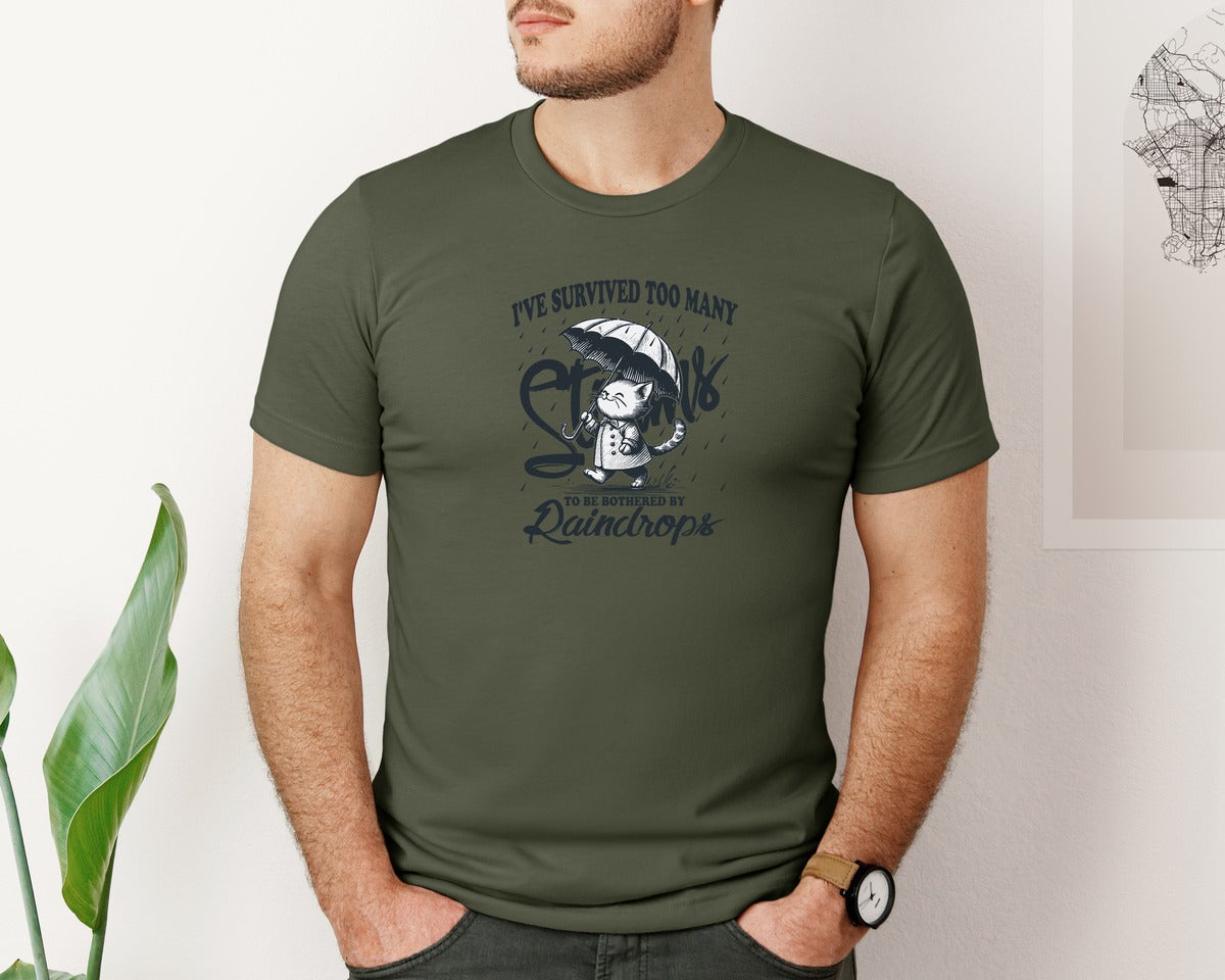 brand:Bella Canvas|color:Military Green|Ive Survived Too Many Storms Cat Shirt Graphic T-Shirt