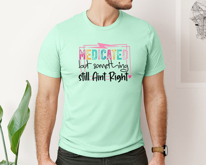 brand:Bella Canvas|color:Mint|Medicated But Somethin Aint Right Snarky Graphic T-Shirt