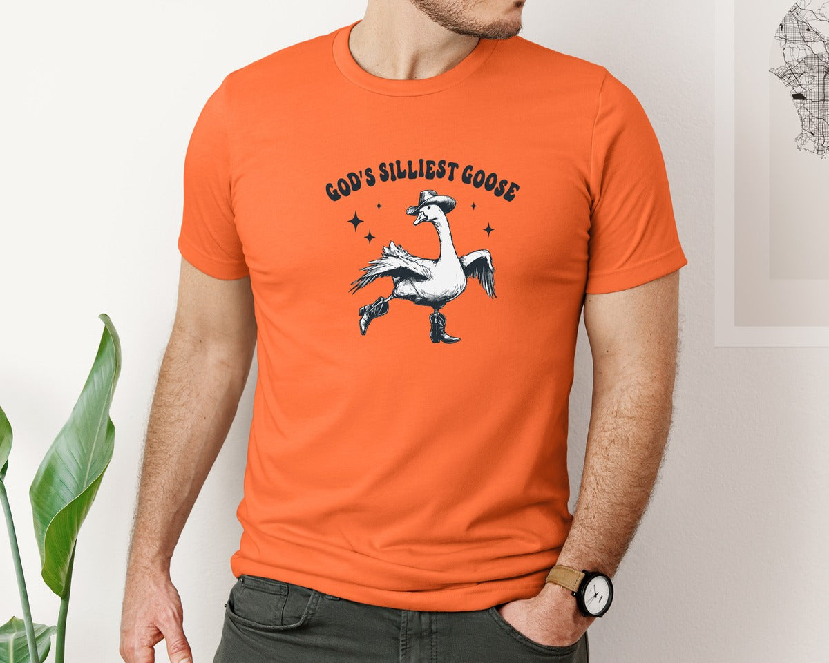 brand:Bella Canvas|color:Orange|Gods Silliest Cowboy Goose Dancing Shir Graphic T-Shirt