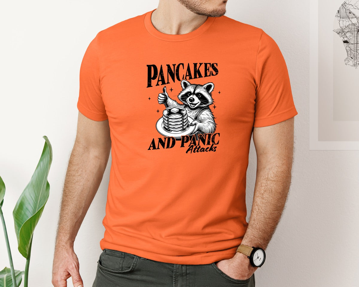 brand:Bella Canvas|color:Orange|Mental Health Raccoon Pancakes And Panic Graphic T-Shirt