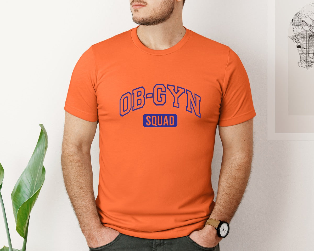 brand:Bella Canvas|color:Orange|Ob Gyn Onc Squad At Your Cervix Graphic T-Shirt