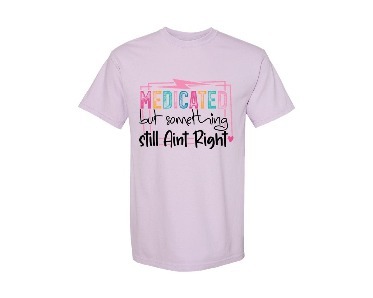 brand:Comfort Colors|color:Orchid|Medicated But Somethin Aint Right Snarky Graphic T-Shirt