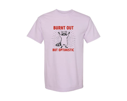 brand:Comfort Colors|color:Orchid|Burnt Out But Optimistic Raccoon Graphic T-Shirt